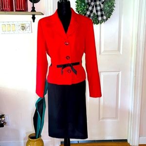 Red top Black skirt. Size 14.